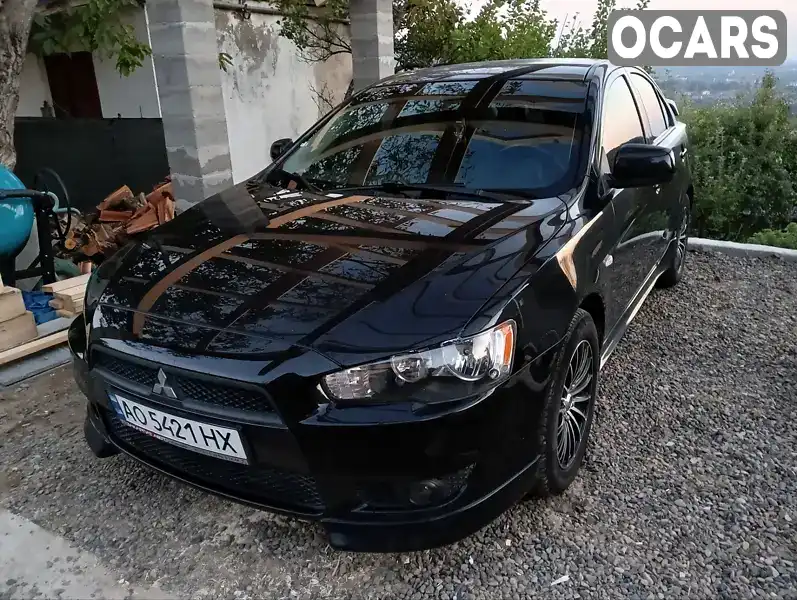 Седан Mitsubishi Lancer 2009 2 л. Ручна / Механіка обл. Закарпатська, Ужгород - Фото 1/17