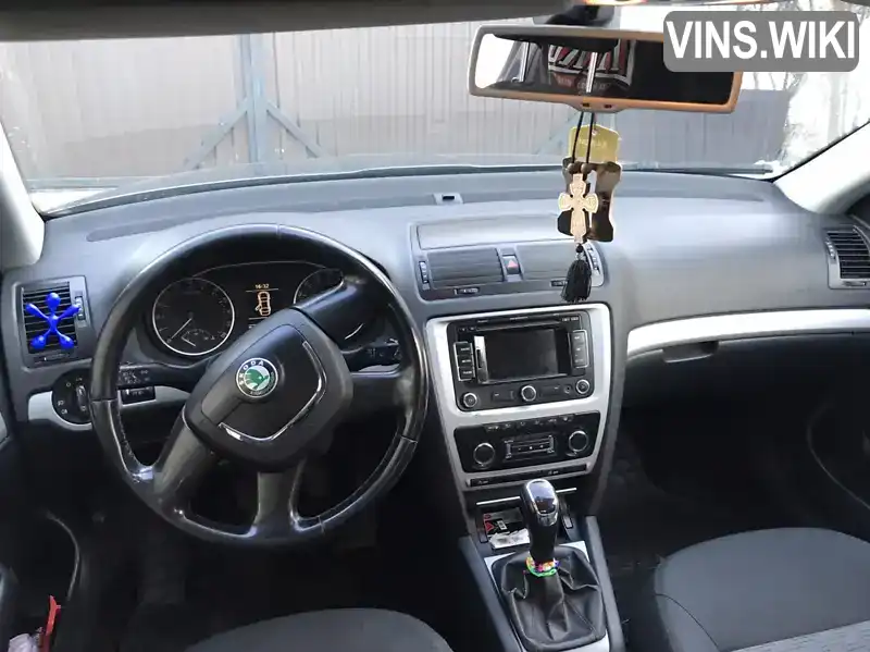 TMBHT21Z1C2105531 Skoda Octavia 2012 Универсал 1.6 л. Фото 7