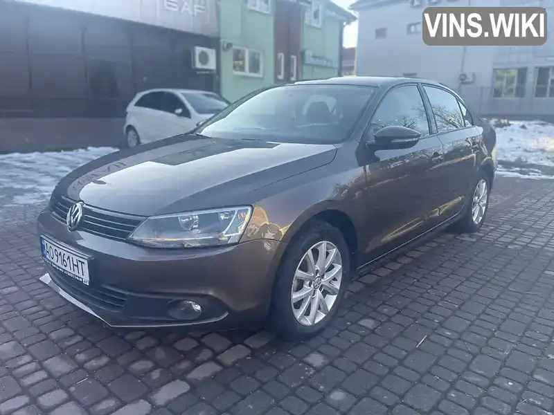 Седан Volkswagen Jetta 2011 1.4 л. Ручна / Механіка обл. Запорізька, Запоріжжя - Фото 1/21