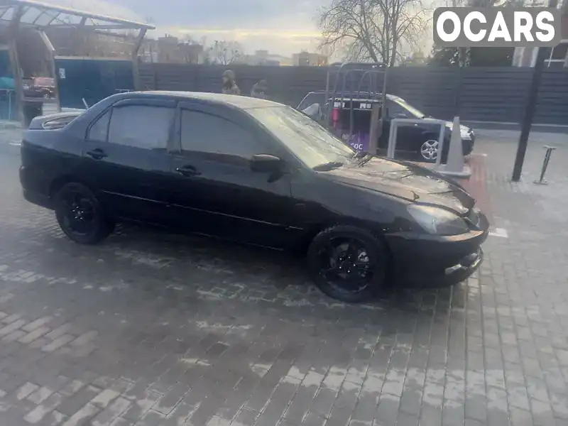 Седан Mitsubishi Lancer 2006 2 л. Ручна / Механіка обл. Черкаська, Черкаси - Фото 1/9