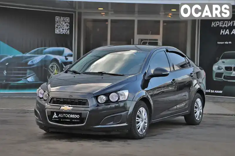 Седан Chevrolet Aveo 2014 1.4 л. Автомат обл. Харьковская, Харьков - Фото 1/18