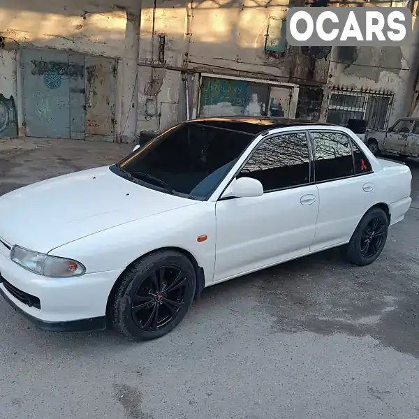 Седан Mitsubishi Lancer 1995 1.6 л. Ручная / Механика обл. Запорожская, Запорожье - Фото 1/20