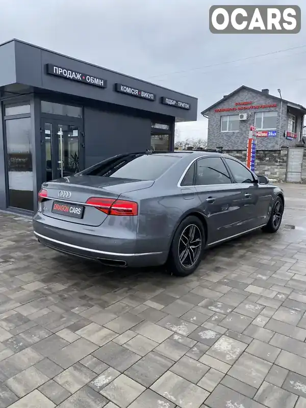 Седан Audi A8 2014 3 л. Типтронік обл. Рівненська, Рівне - Фото 1/19