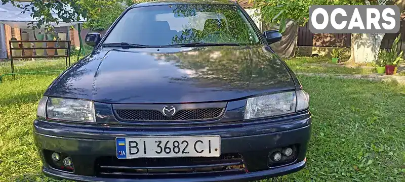 Седан Mazda 323 1997 1.49 л. Ручна / Механіка обл. Полтавська, Полтава - Фото 1/21