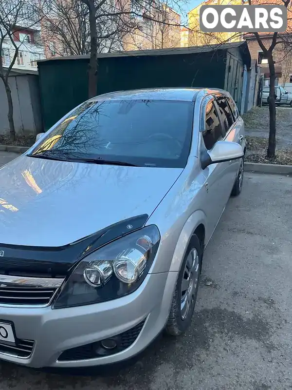 W0L0AHL35B2009643 Opel Astra 2010 Универсал 1.69 л. Фото 1