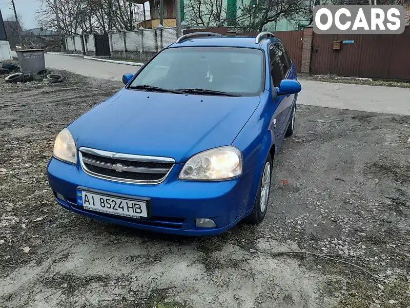 Універсал Chevrolet Lacetti 2012 1.8 л. Ручна / Механіка обл. Київська, Вишневе - Фото 1/17