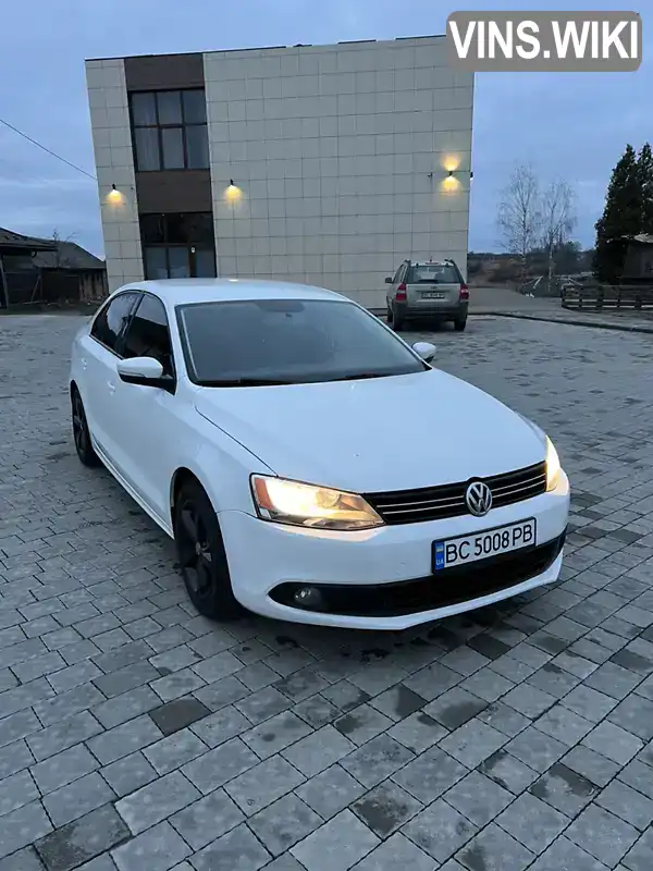 Седан Volkswagen Jetta 2013 2 л. Автомат обл. Львівська, Львів - Фото 1/21