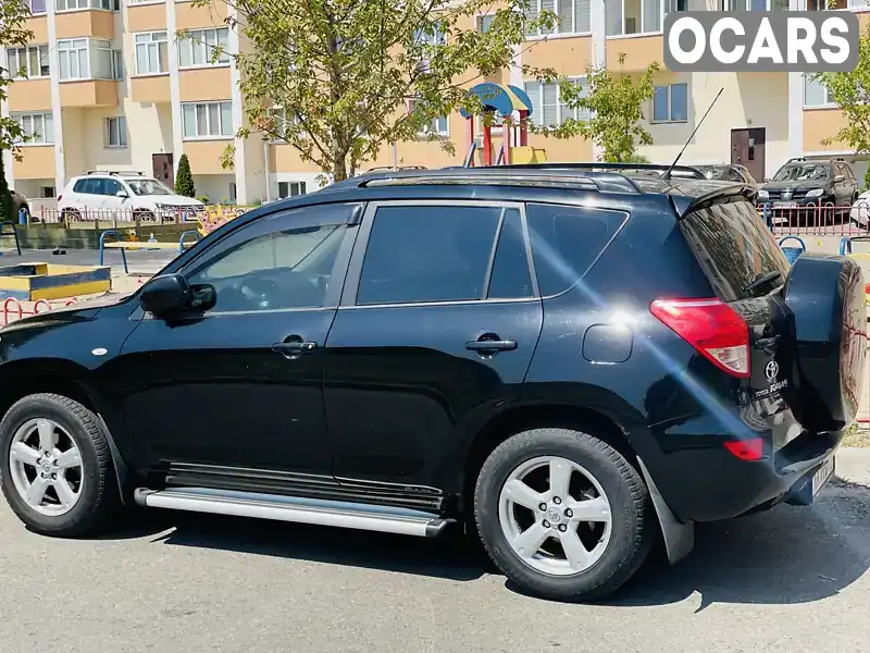 Позашляховик / Кросовер Toyota RAV4 2007 2 л. Автомат обл. Київська, Вишневе - Фото 1/8