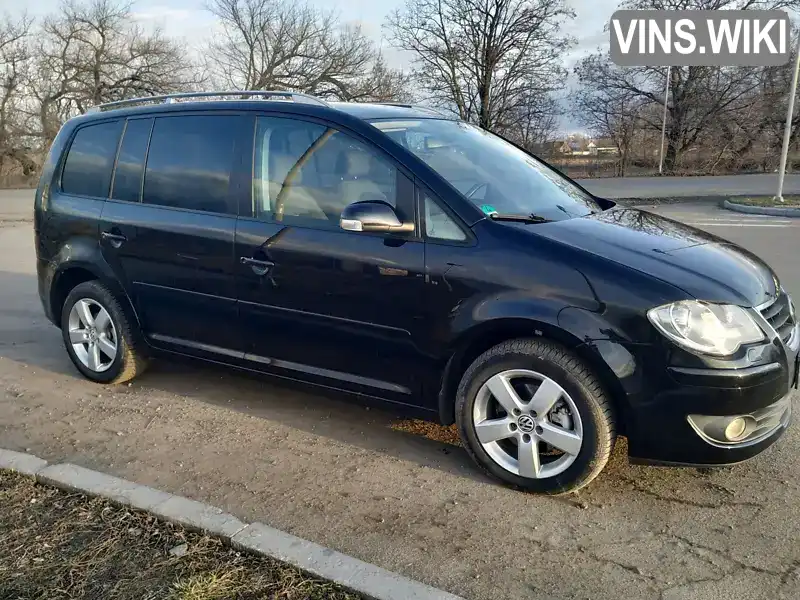 Мінівен Volkswagen Touran 2008 1.4 л. Автомат обл. Вінницька, Немирів - Фото 1/19