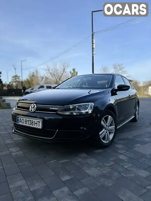 Седан Volkswagen Jetta 2013 1.39 л. Робот обл. Закарпатська, Ужгород - Фото 1/14