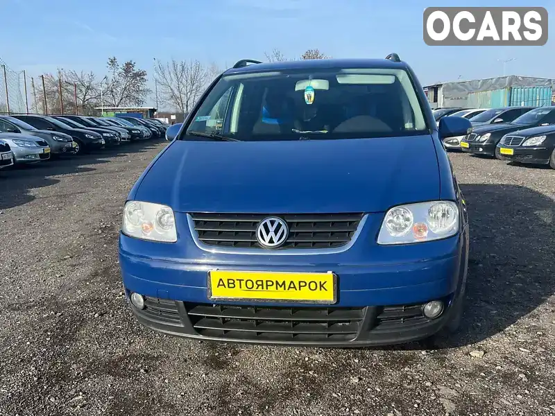 Мінівен Volkswagen Touran 2006 1.9 л. Ручна / Механіка обл. Закарпатська, Ужгород - Фото 1/12