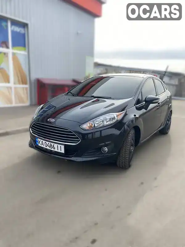 Седан Ford Fiesta 2013 1.6 л. Автомат обл. Сумська, Шостка - Фото 1/21