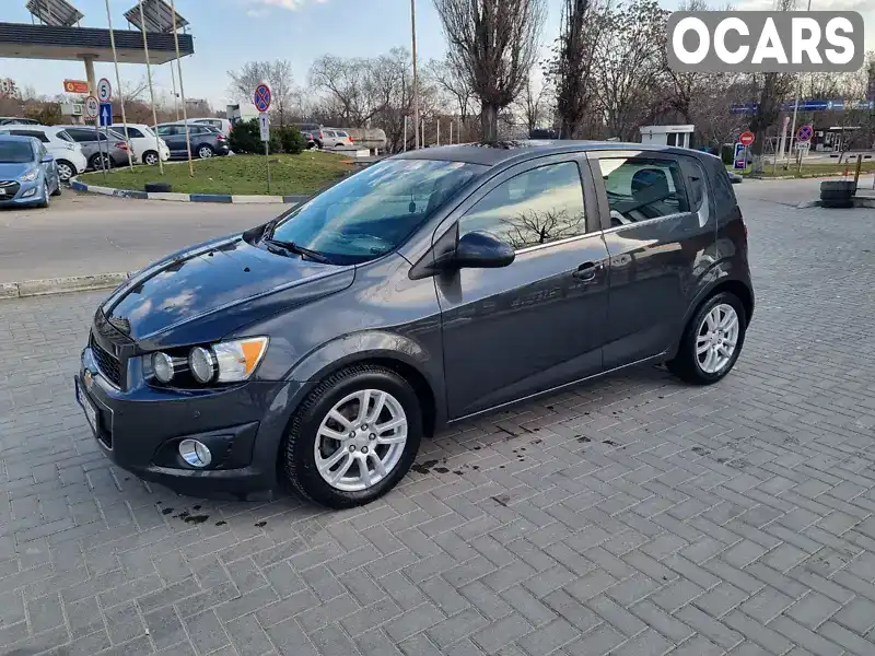 1G1JC6SB1E4181762 Chevrolet Sonic 2014 Хэтчбек 1.36 л. Фото 1