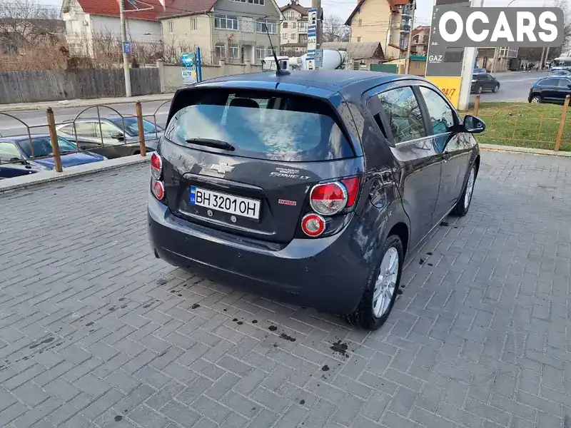 1G1JC6SB1E4181762 Chevrolet Sonic 2014 Хэтчбек 1.36 л. Фото 7