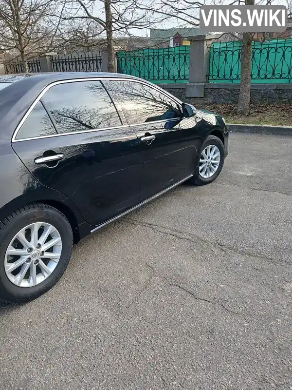 Седан Toyota Camry 2014 2.49 л. Автомат обл. Черкасская, Умань - Фото 1/17