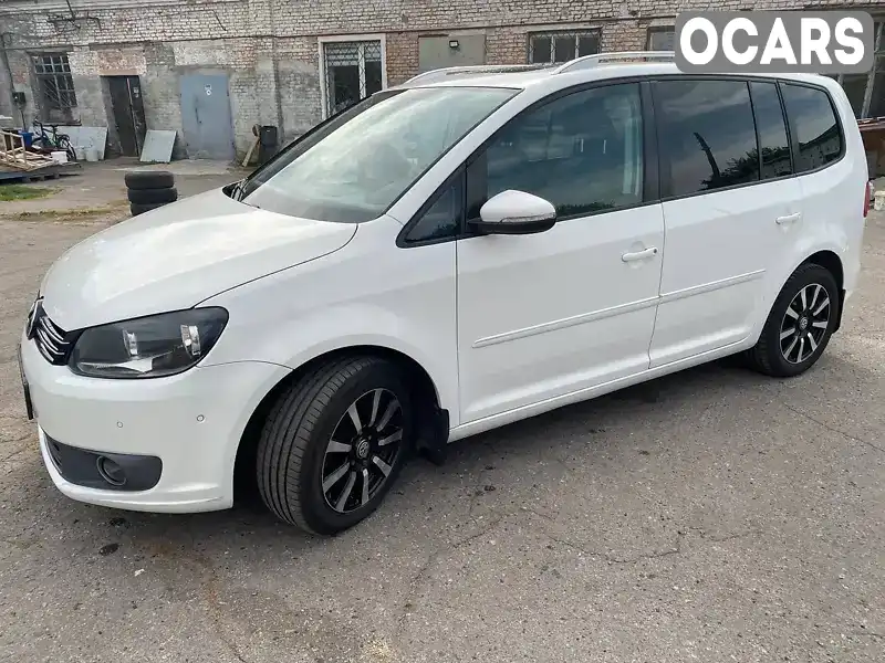 Мінівен Volkswagen Touran 2011 1.97 л. обл. Полтавська, Лубни - Фото 1/21