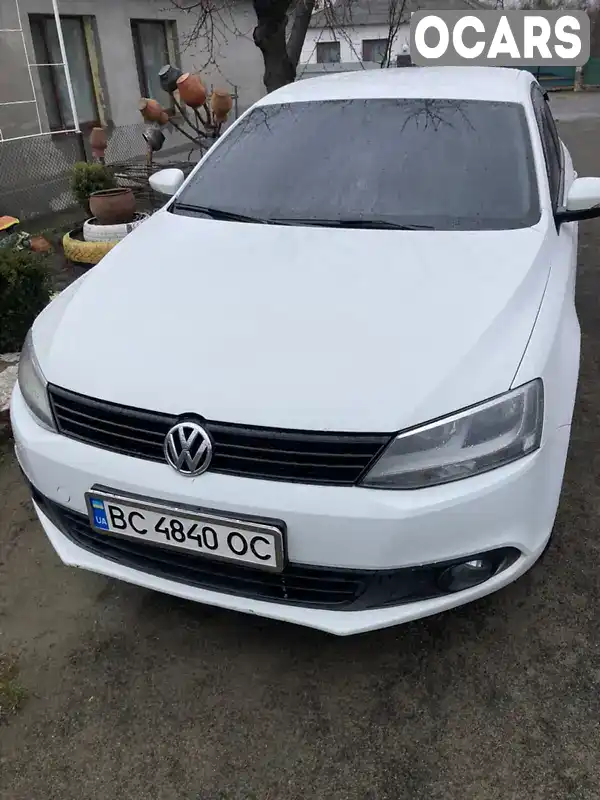 Седан Volkswagen Jetta 2014 2 л. Ручна / Механіка обл. Кіровоградська, Гайворон - Фото 1/11