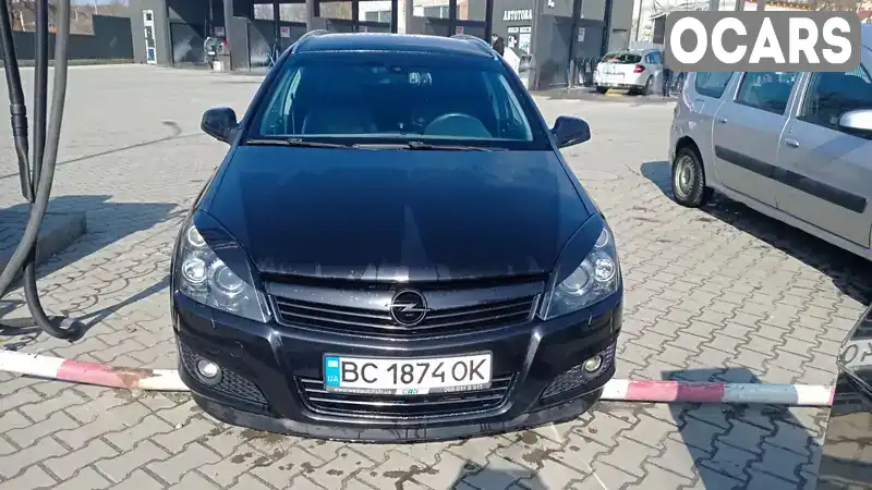 W0L0AHL35A5050949 Opel Astra 2010 Универсал 1.9 л. Фото 1