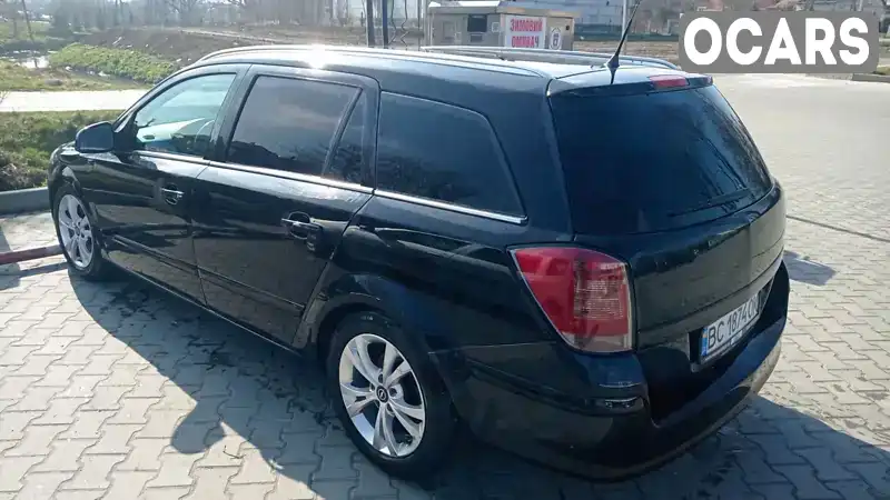 W0L0AHL35A5050949 Opel Astra 2010 Універсал 1.9 л. Фото 2