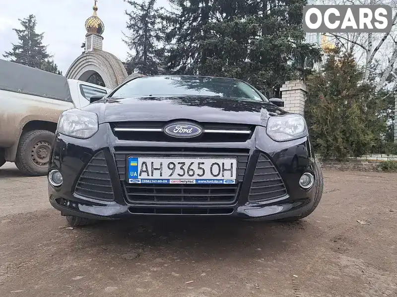 Седан Ford Focus 2013 1.6 л. Ручная / Механика обл. Донецкая, Славянск - Фото 1/18