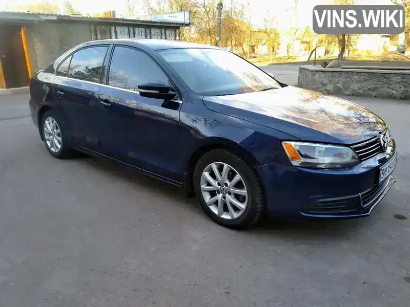 Седан Volkswagen Jetta 2014 1.8 л. Ручна / Механіка обл. Сумська, Ромни - Фото 1/9