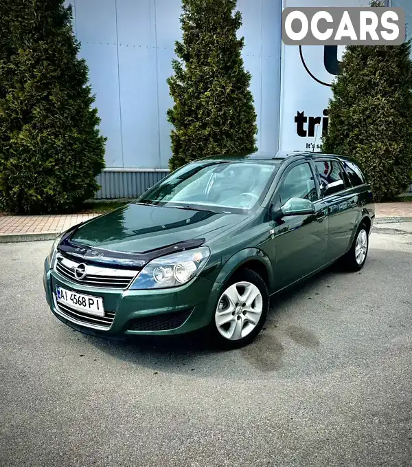 W0L0AHL35B2034466 Opel Astra 2010 Універсал 1.69 л. Фото 1