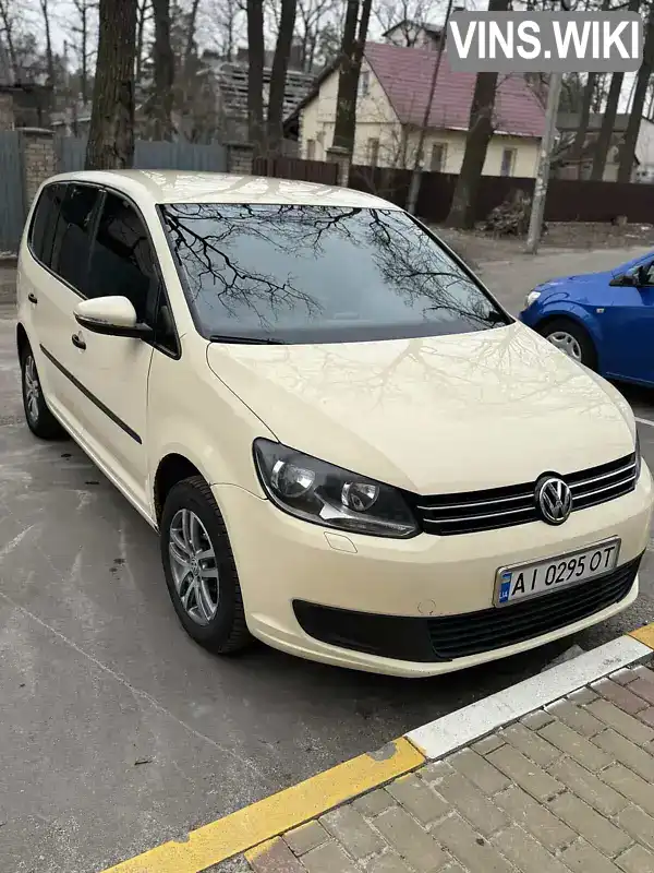 Мінівен Volkswagen Touran 2014 2 л. Робот обл. Київська, Ірпінь - Фото 1/19