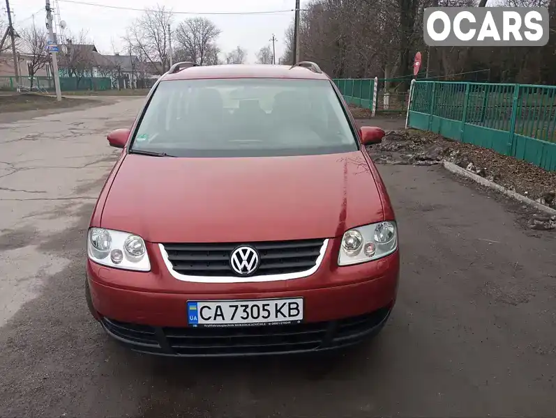 Минивэн Volkswagen Touran 2006 1.6 л. Ручная / Механика обл. Черкасская, Христиновка - Фото 1/21