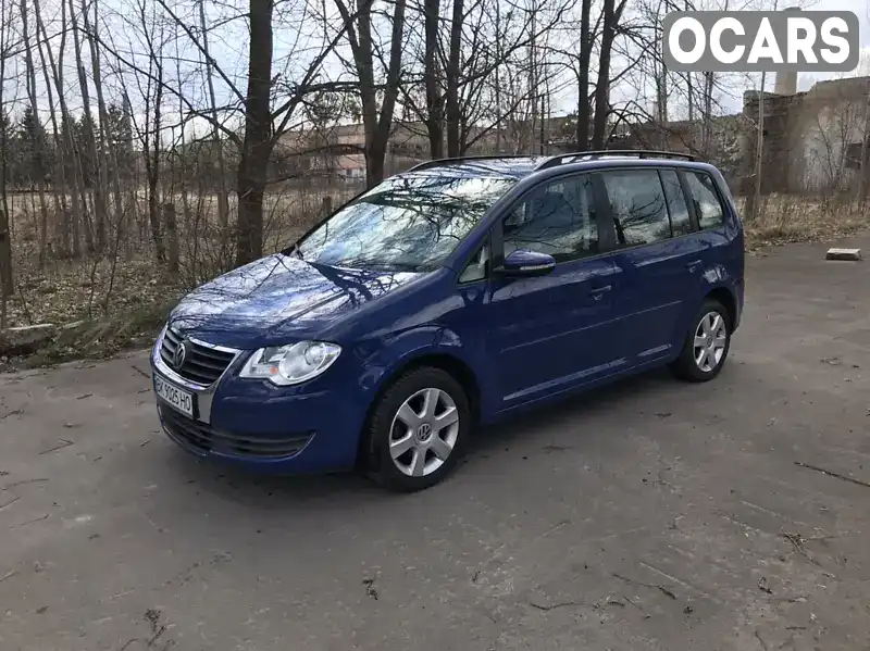 Минивэн Volkswagen Touran 2009 1.6 л. Ручная / Механика обл. Ровенская, Костополь - Фото 1/21