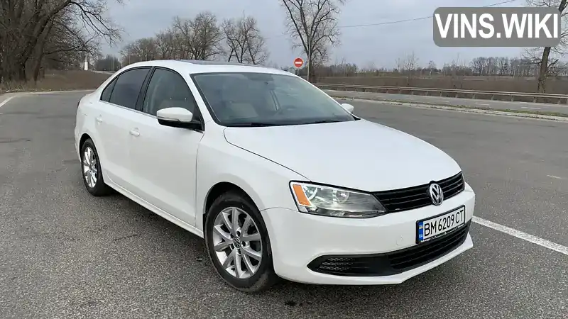 Седан Volkswagen Jetta 2013 1.8 л. Автомат обл. Сумська, Ромни - Фото 1/17