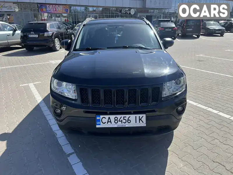 Позашляховик / Кросовер Jeep Compass 2015 2 л. Автомат обл. Київська, Вишневе - Фото 1/9