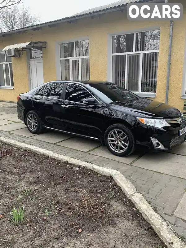 Седан Toyota Camry 2014 2.5 л. Автомат обл. Одеська, Подільськ (Котовськ) - Фото 1/12