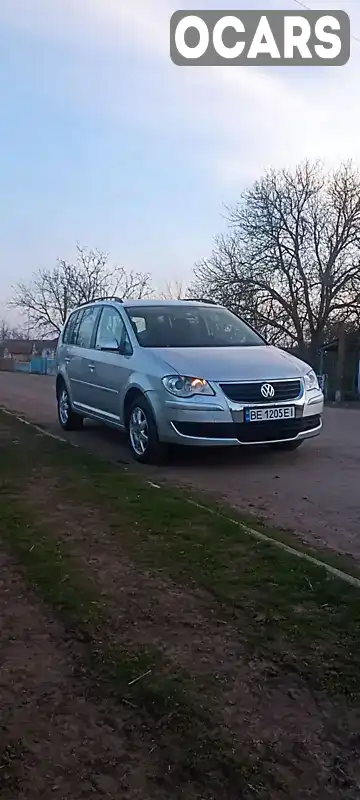 Мінівен Volkswagen Touran 2008 1.39 л. Ручна / Механіка обл. Миколаївська, Миколаїв - Фото 1/19