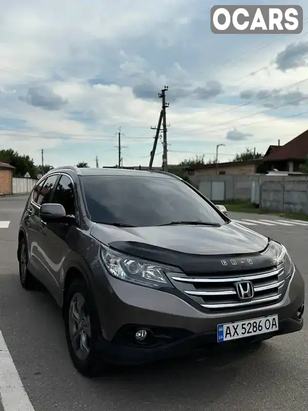 Позашляховик / Кросовер Honda CR-V 2013 2.35 л. Автомат обл. Харківська, Харків - Фото 1/21