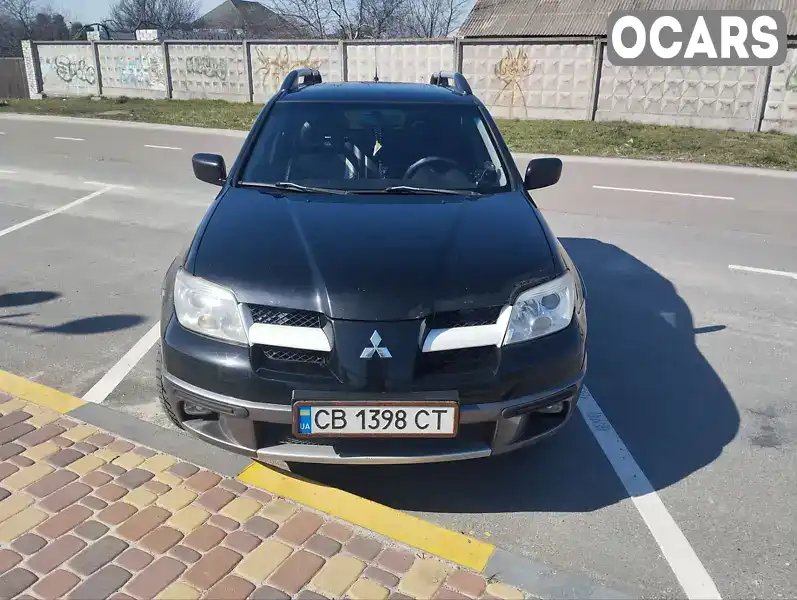 Позашляховик / Кросовер Mitsubishi Outlander 2005 2.38 л. Автомат обл. Київська, Вишгород - Фото 1/16