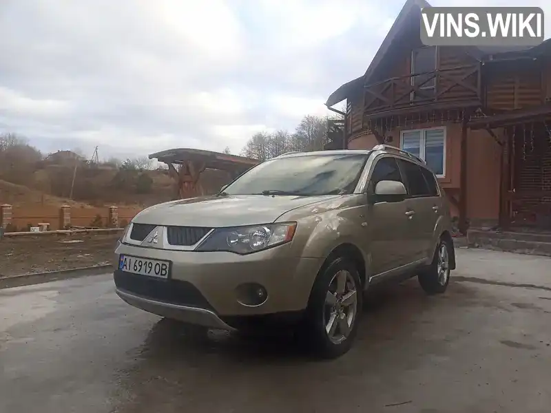 Позашляховик / Кросовер Mitsubishi Outlander 2008 3 л. Автомат обл. Київська, Вишневе - Фото 1/18