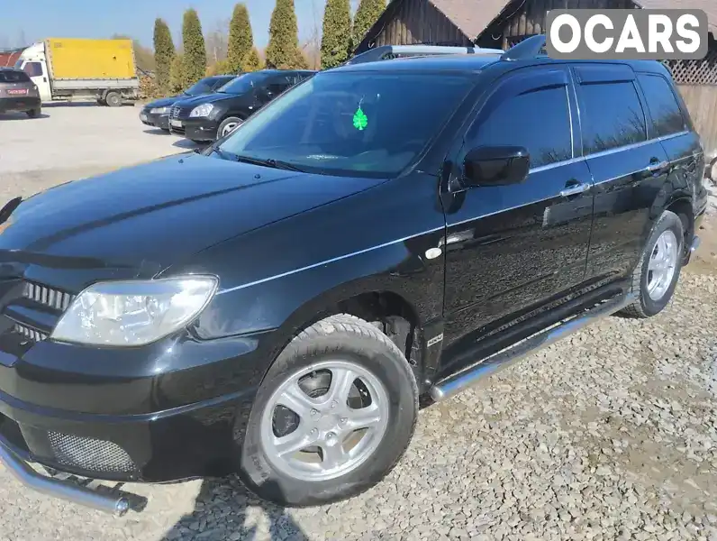 Позашляховик / Кросовер Mitsubishi Outlander 2004 2.4 л. Автомат обл. Івано-Франківська, Надвірна - Фото 1/11