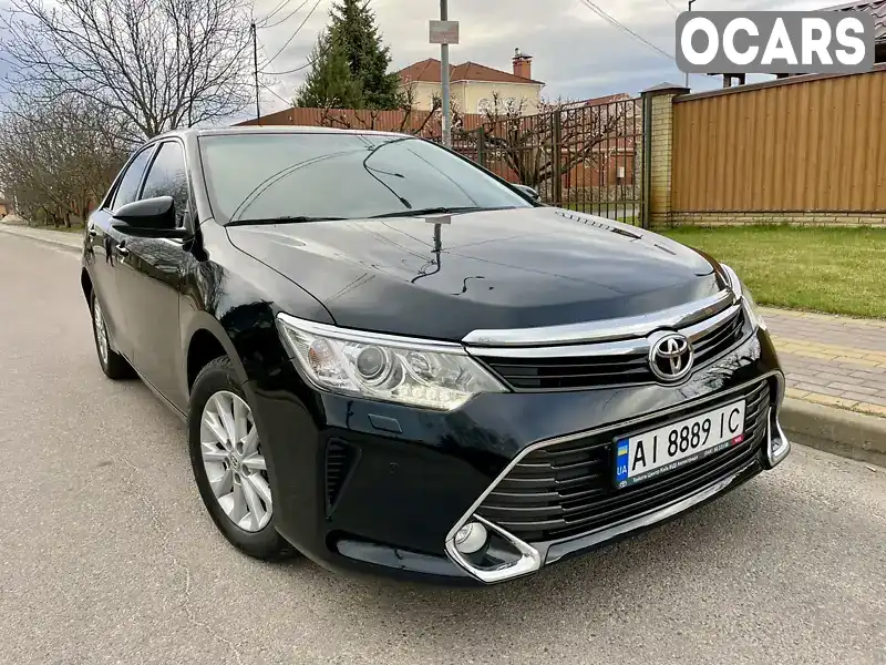 Седан Toyota Camry 2016 2.49 л. Автомат обл. Київська, Вишневе - Фото 1/21