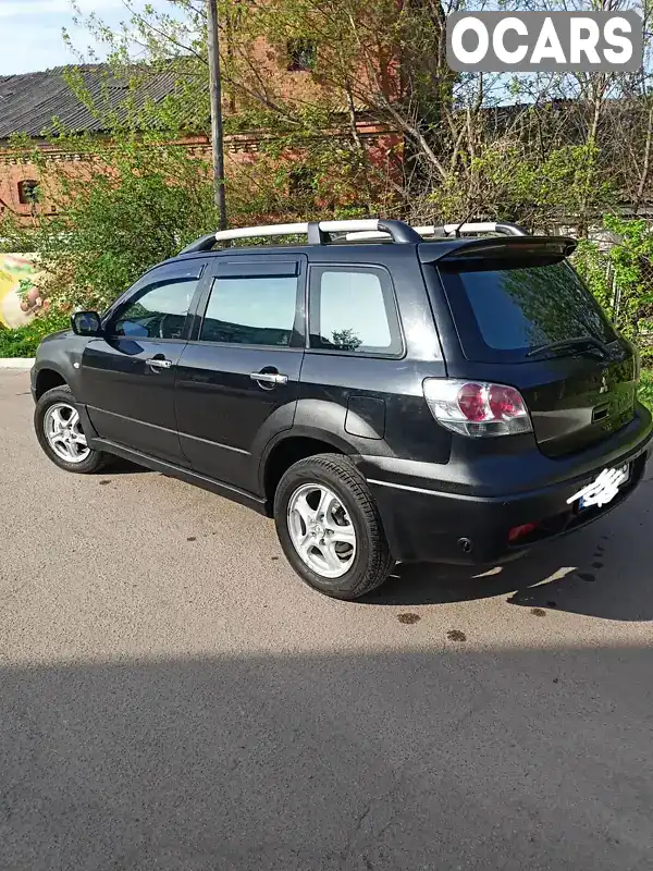 Позашляховик / Кросовер Mitsubishi Outlander 2003 2 л. Ручна / Механіка обл. Житомирська, Житомир - Фото 1/21