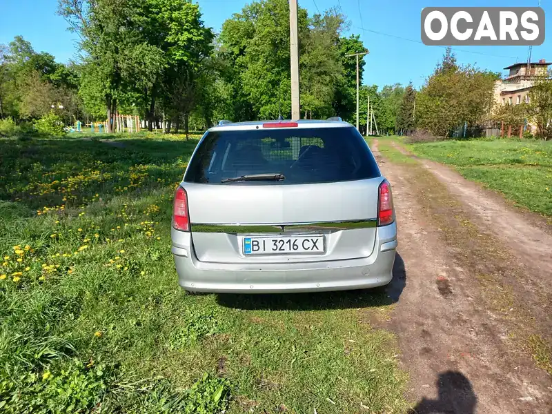 W0L0AHL3592092448 Opel Astra 2009 Универсал 1.9 л. Фото 2