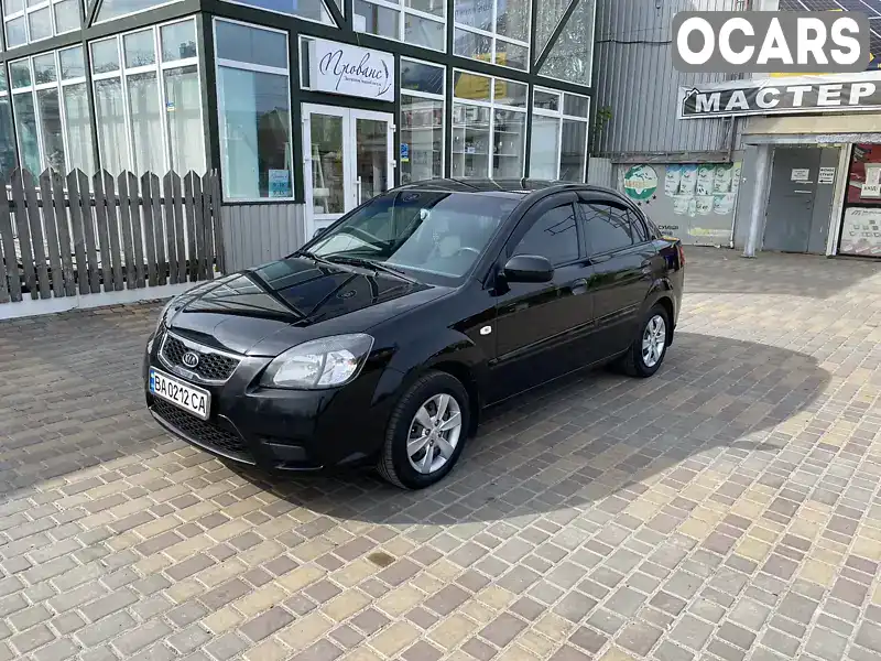 Седан Kia Rio 2010 1.4 л. Ручна / Механіка обл. Кіровоградська, Кропивницький (Кіровоград) - Фото 1/17