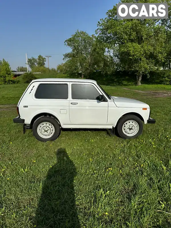 XTA212140C2051983 ВАЗ / Lada 21214 / 4x4 2012 Позашляховик / Кросовер 1.7 л. Фото 7