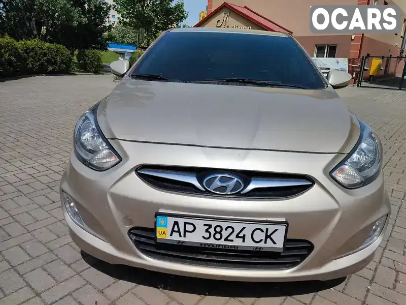 Хетчбек Hyundai Accent 2013 1.4 л. Ручна / Механіка обл. Запорізька, Запоріжжя - Фото 1/9