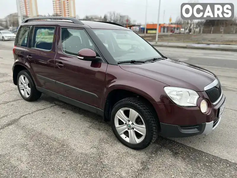 Позашляховик / Кросовер Skoda Yeti 2012 1.8 л. Ручна / Механіка обл. Київська, Вишневе - Фото 1/21