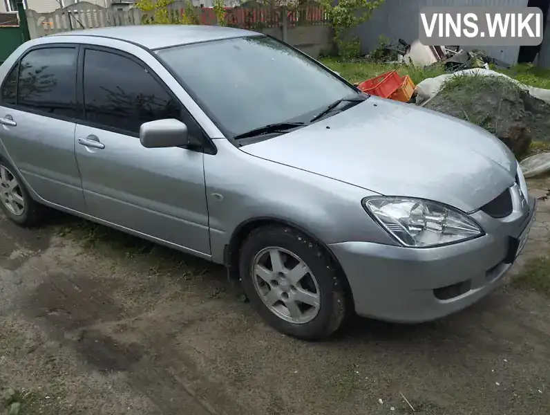 Седан Mitsubishi Lancer 2004 1.6 л. Ручна / Механіка обл. Дніпропетровська, Новомосковськ - Фото 1/21