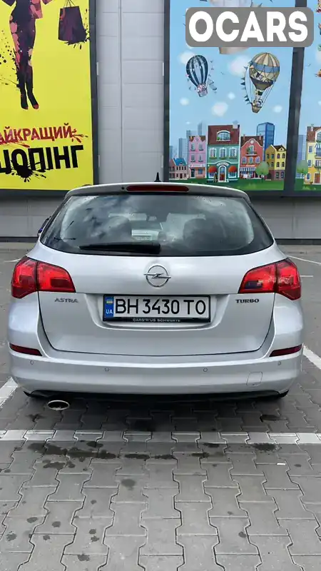 W0LPD8EJ1B8030114 Opel Astra 2010 Универсал 1.61 л. Фото 6