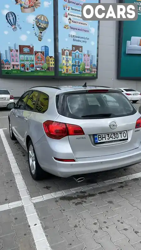 W0LPD8EJ1B8030114 Opel Astra 2010 Универсал 1.61 л. Фото 7