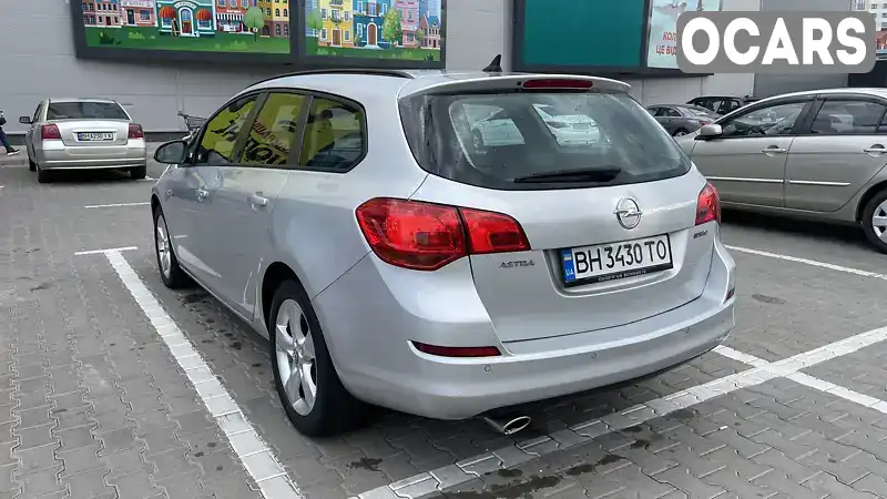 W0LPD8EJ1B8030114 Opel Astra 2010 Универсал 1.61 л. Фото 8