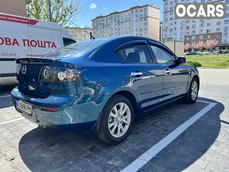 Седан Mazda 3 2007 1.6 л. Ручная / Механика обл. Киевская, Вышневое - Фото 1/14