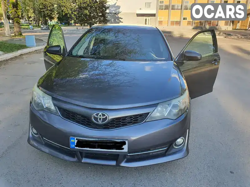 Седан Toyota Camry 2014 2.49 л. Автомат обл. Донецька, Покровськ (Красноармійськ) - Фото 1/14